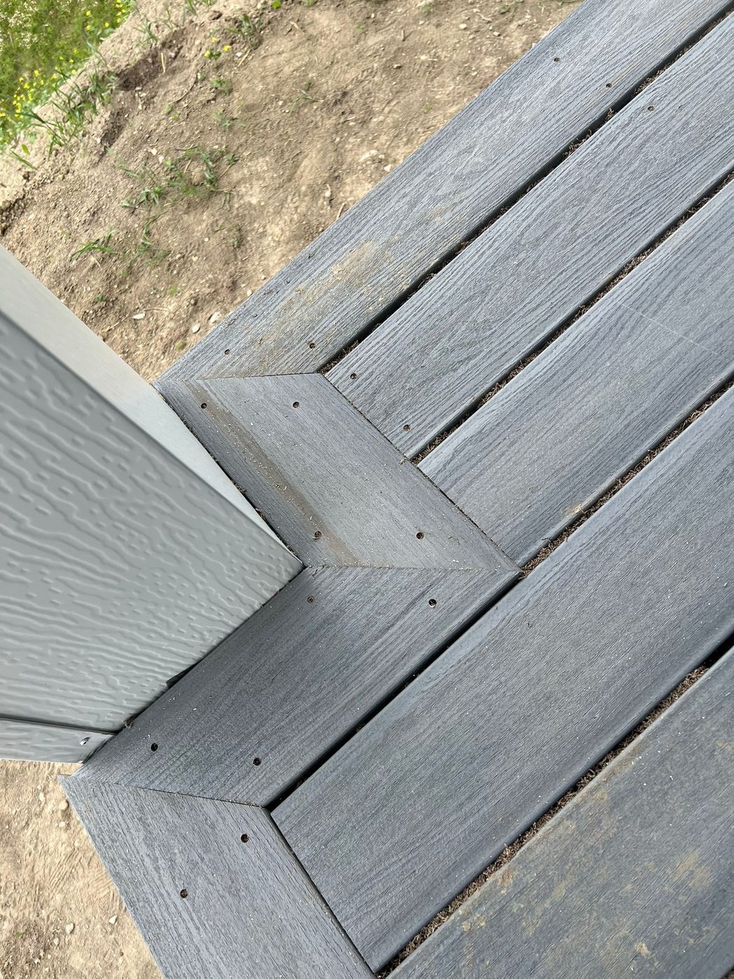 Composite deck corner detail with fascia board Regina SK
