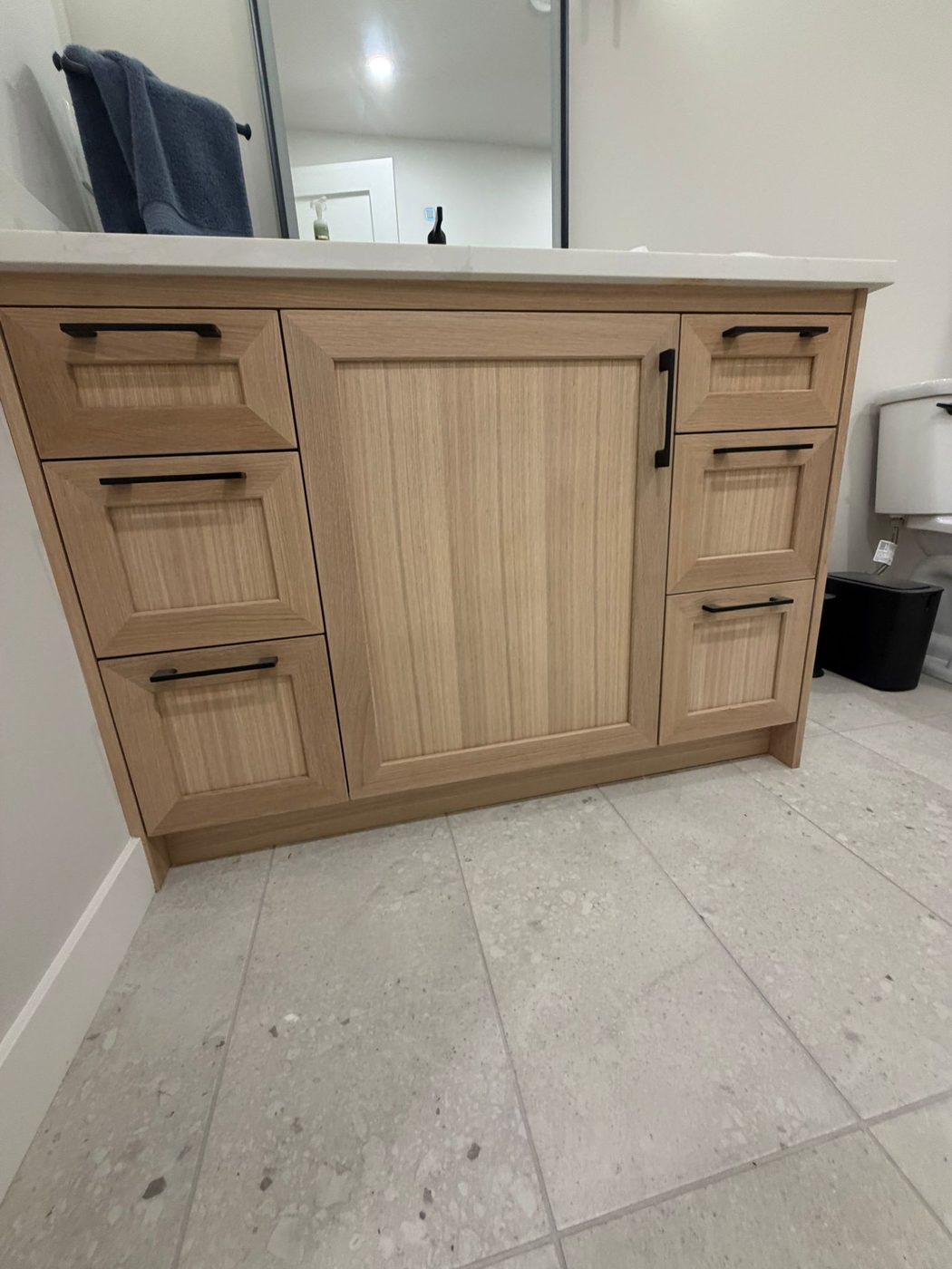 Bathroom vanity light oak finish black hardware Regina SK