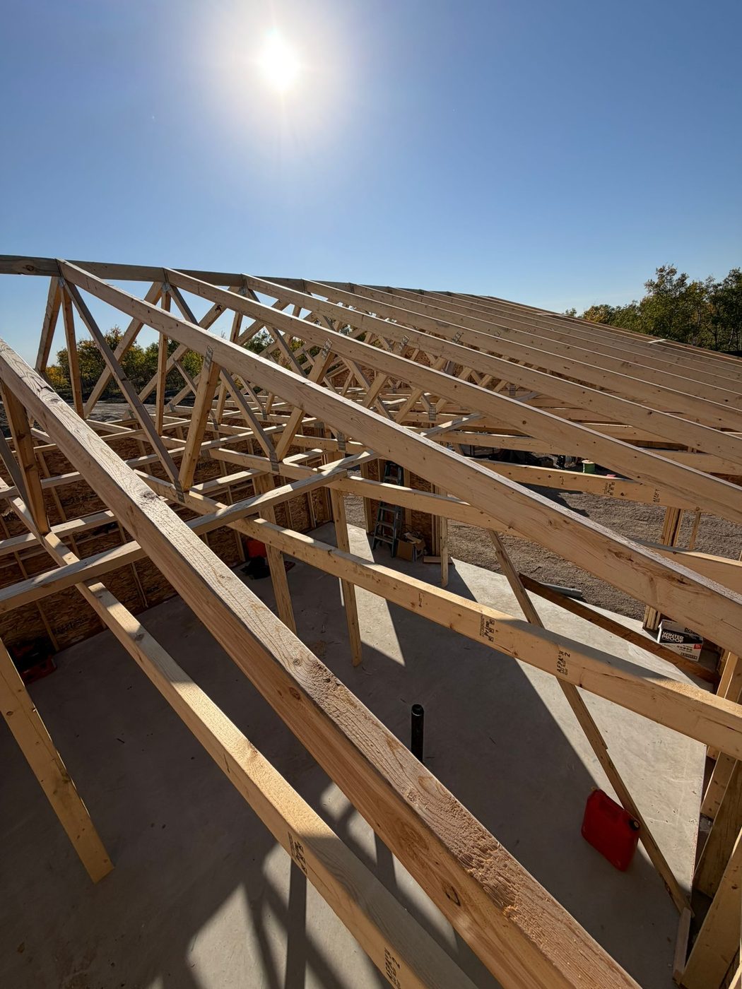 Garage build roof truss installation dramatic angle Regina SK