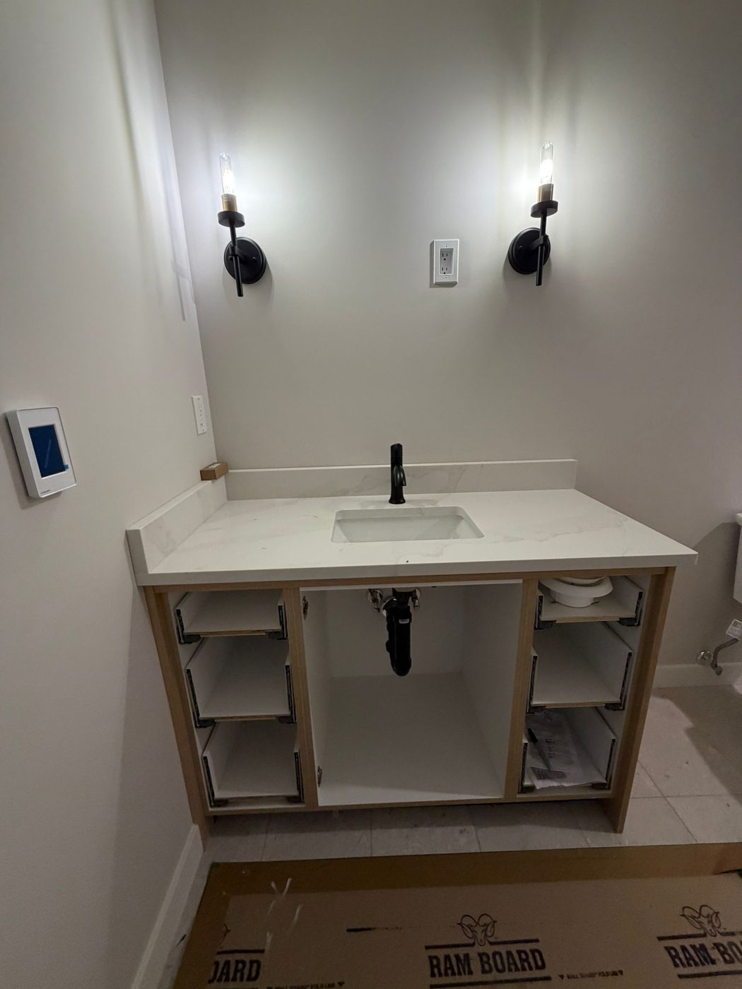 Bathroom vanity with sconce lighting install Regina SK